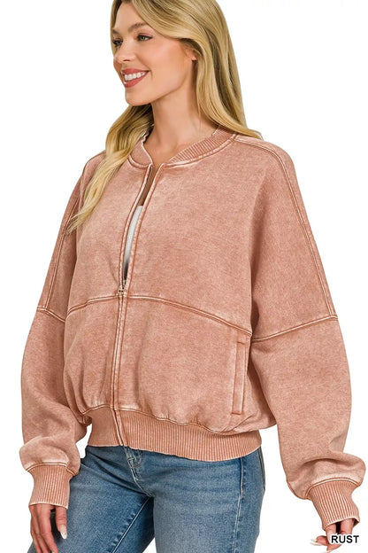 Rust-colored Zenana acid washed fleece jacket with a relaxed fit and zip-up front, featuring a soft, cozy texture.