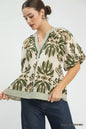 Sage green Umgee printed puff sleeve top with contrast trim, showcasing a stylish mix pattern and feminine sleeve design.