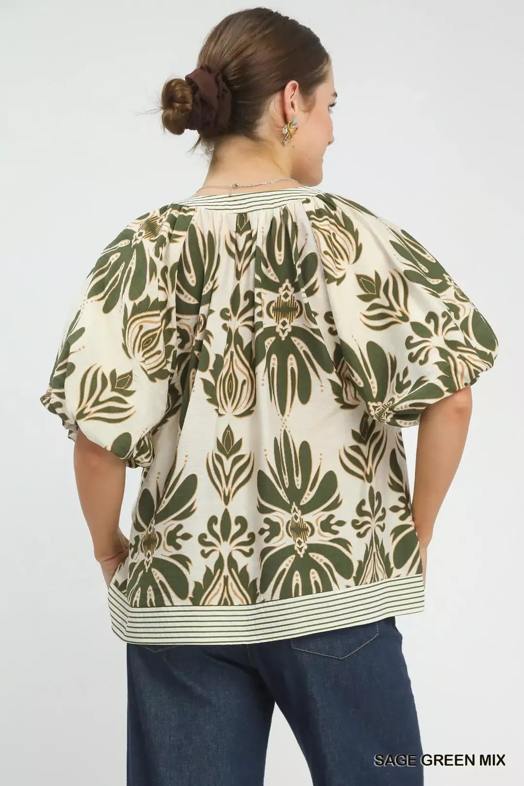 Sage green Umgee printed puff sleeve top with contrast trim, featuring mixed patterns and stylish design.