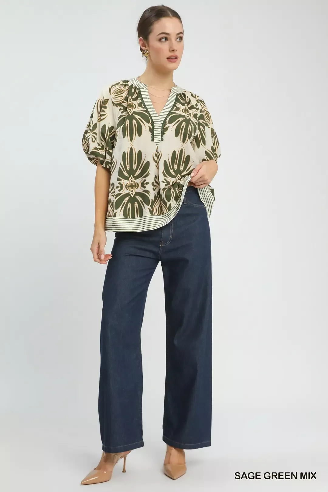 Sage green Umgee printed puff sleeve top with contrast trim, featuring a stylish mix pattern and feminine design.