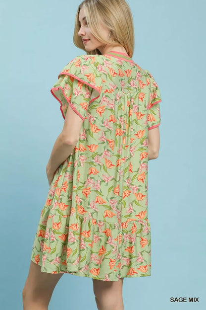 Umgee floral tiered dress with flutter sleeves in sage, featuring a feminine and flowy design perfect for casual wear.