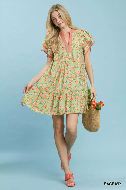Umgee floral flutter sleeve tiered dress in sage mix, featuring a flowy design and feminine tiered layers.