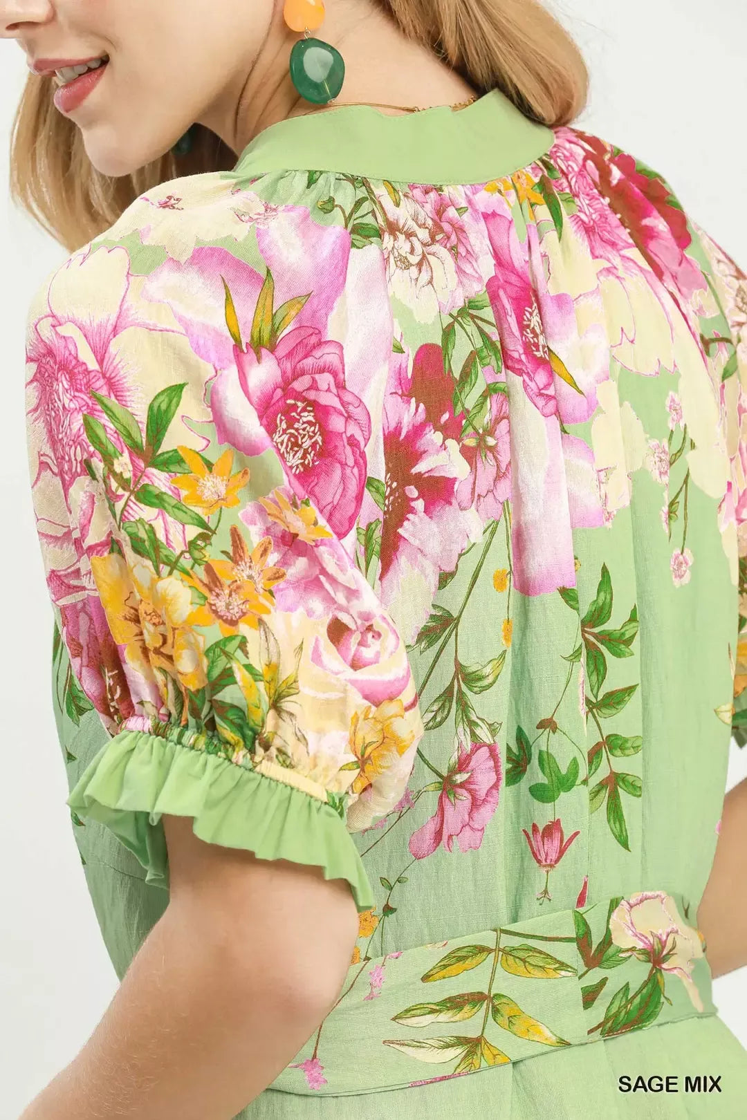 Sage green Umgee Mix Floral Border Print Midi Dress featuring a flowy silhouette and vibrant floral border design.