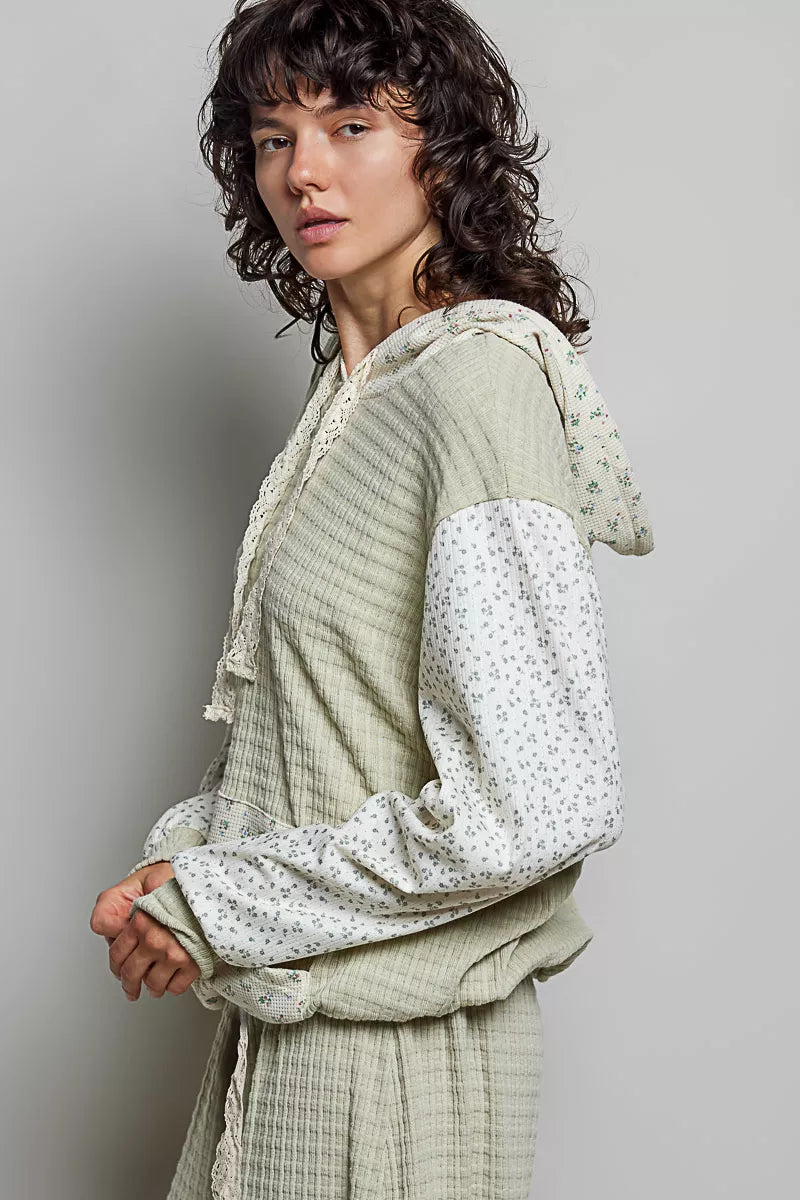 Trendsi POL mixed knit hoodie with contrast printed sleeves and kangaroo pocket, sage color, casual and stylish for everyday wear.