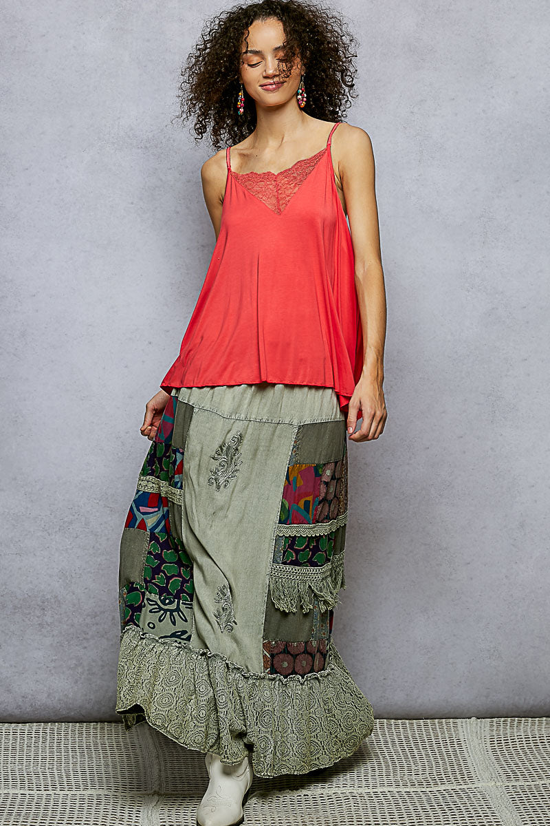 Multi-colored patchwork embroidered ruffled skirt by Trendsi, featuring a stylish design with intricate embroidery and layered ruffles.