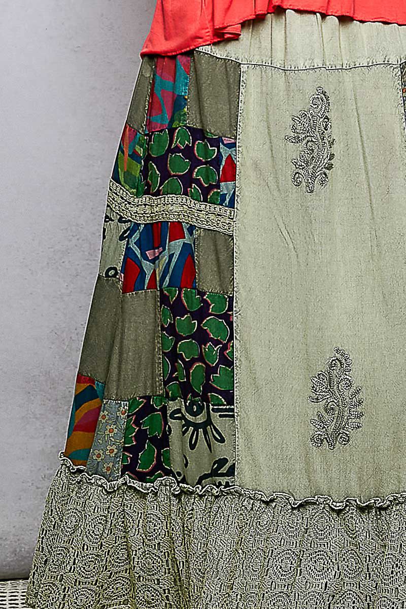 Colorful patchwork embroidered ruffled skirt from Trendsi featuring intricate patterns and a flowy, feminine design.