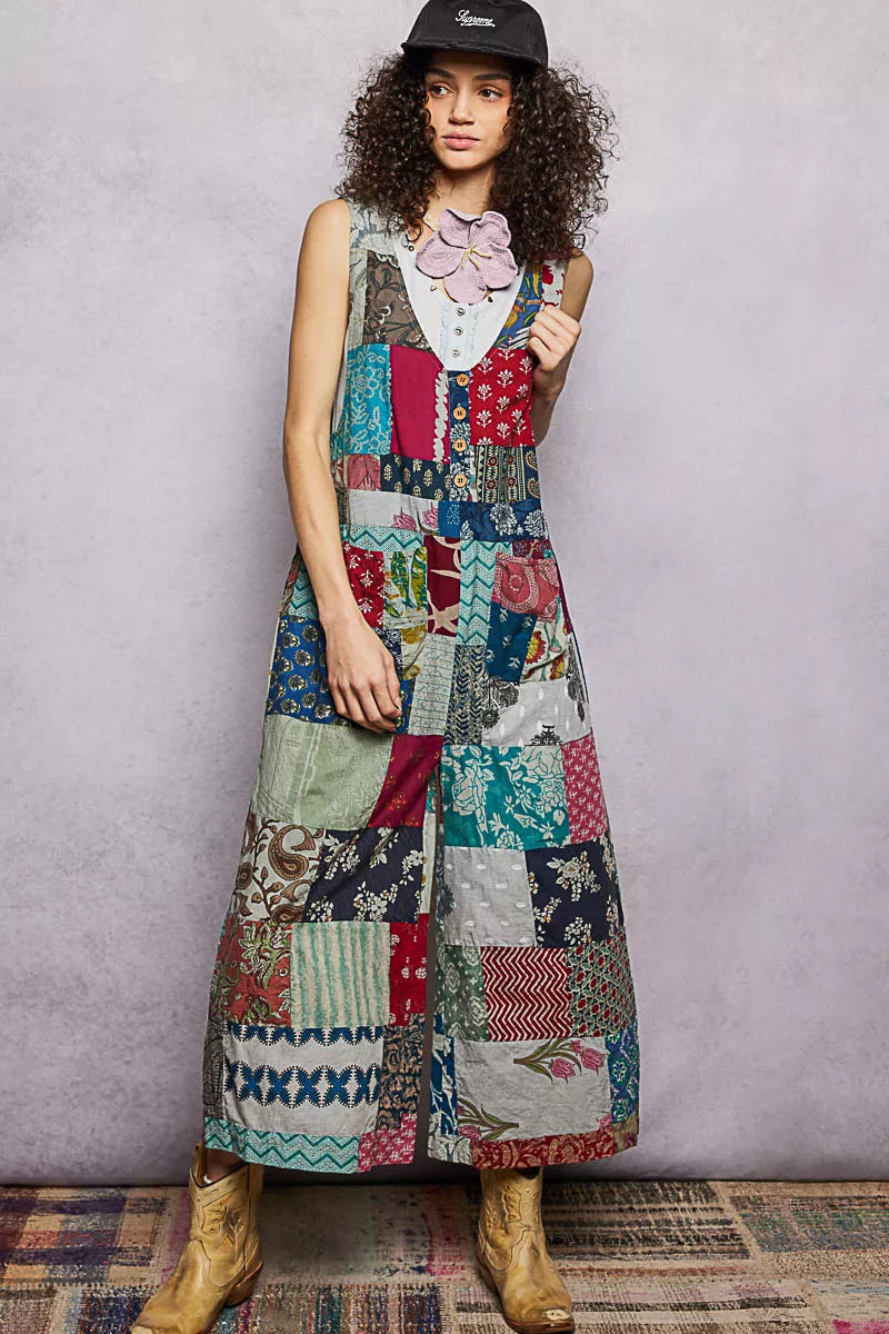 Trendsi sleeveless patchwork wide-leg jumpsuit in sage and multicolor fabric, featuring a relaxed fit and stylish design.