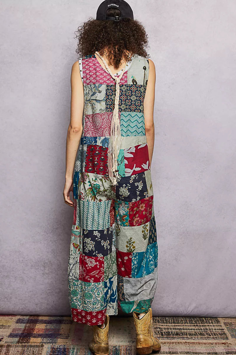 Trendsi POL sleeveless patchwork wide-leg jumpsuit in sage and multicolor fabric, styled with a relaxed fit and wide legs.