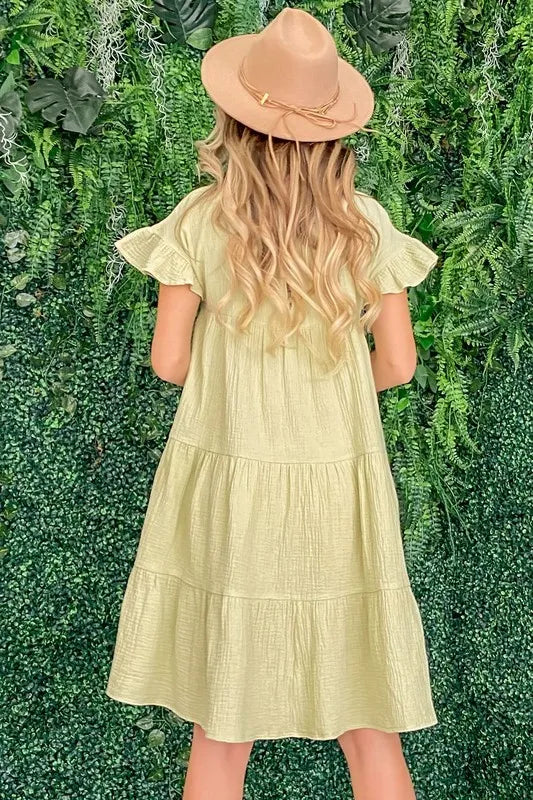 Sage green cotton gauze baby doll casual dress by Trendsi with short sleeves and a relaxed fit, perfect for everyday wear.