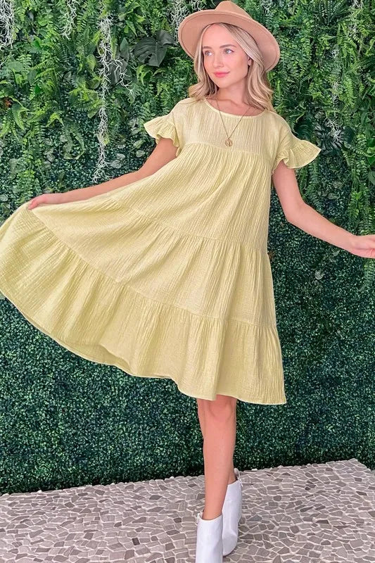 Sage green cotton gauze baby doll casual dress by Trendsi, featuring a relaxed fit and lightweight fabric for comfortable wear.