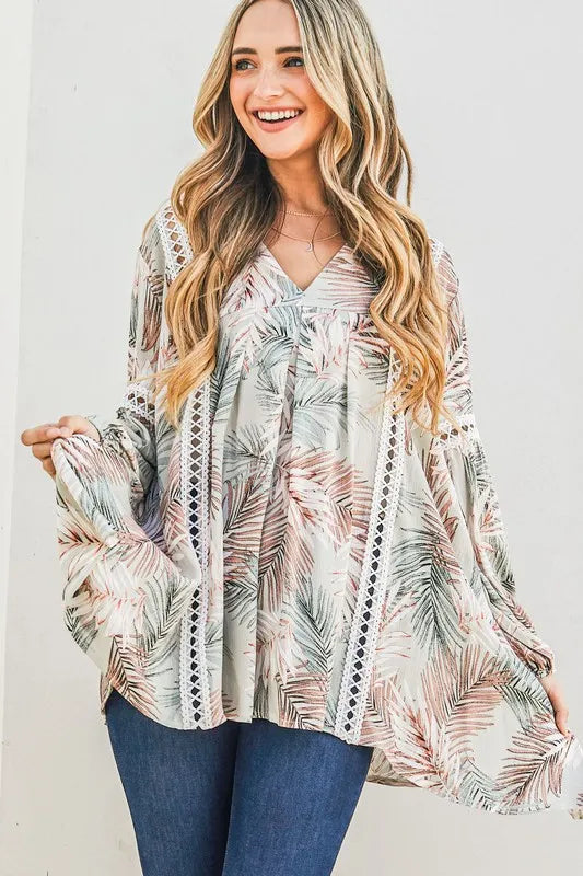 Sage green casual tunic top by Trendsi with printed design and delicate lace trim, relaxed fit and comfortable for everyday wear.