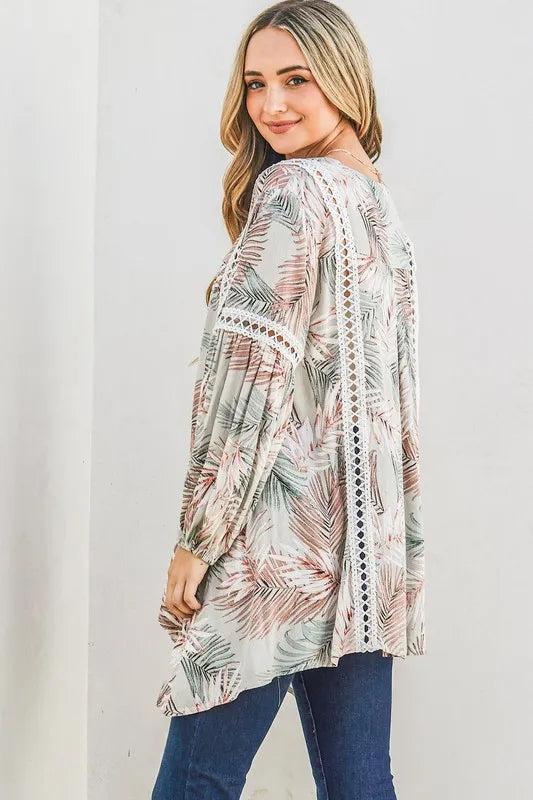Sage green casual tunic top by Trendsi with printed design and lace trim, featuring a relaxed fit and stylish neckline.