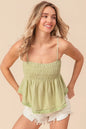 Sage green BiBi fringed hem smocked cami top by Trendsi featuring a fitted design and delicate fringe detail at the hem.