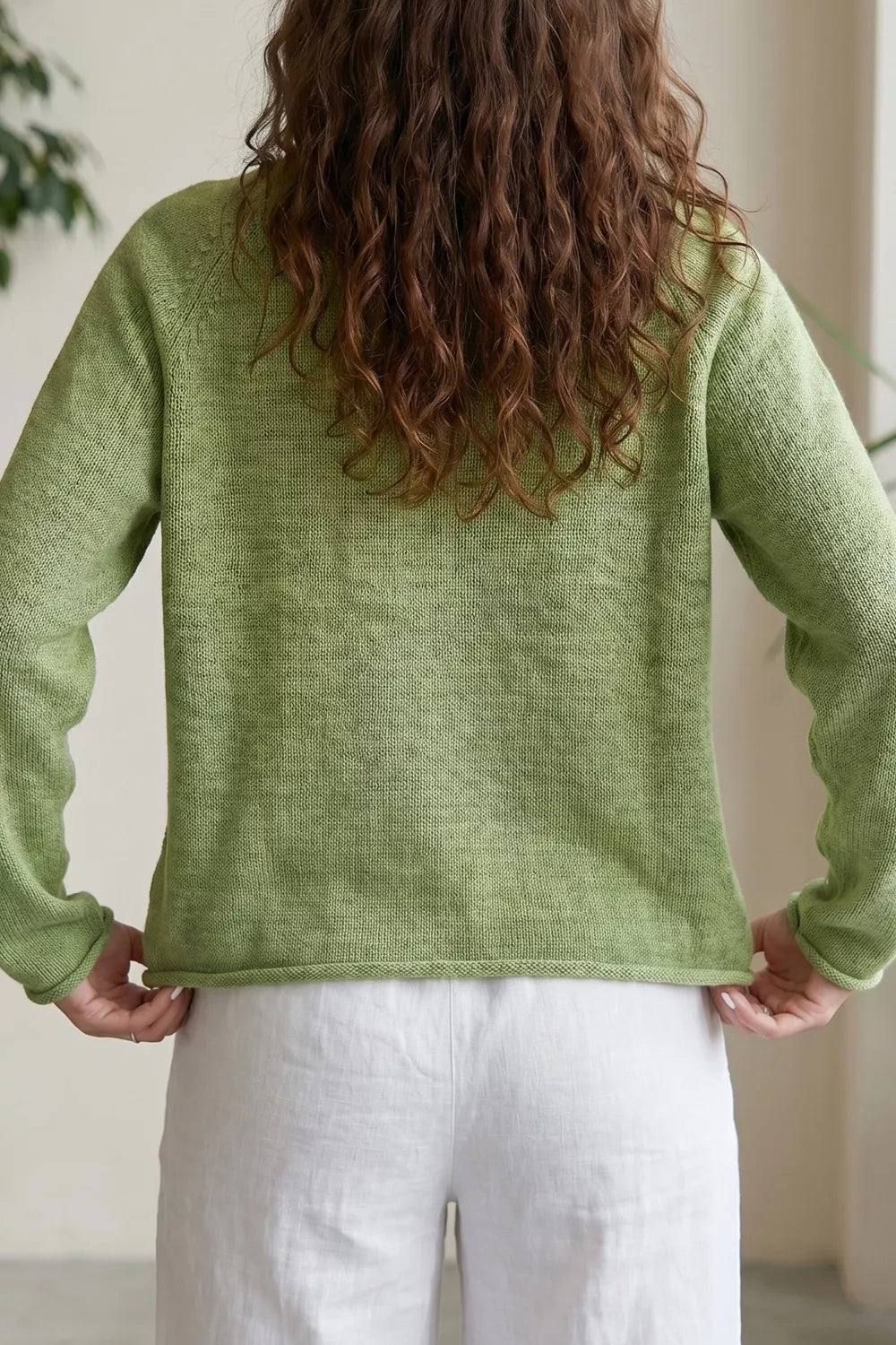 Sage green fish graphic round neck sweater by Trendsi featuring a casual fit and comfortable knit fabric.