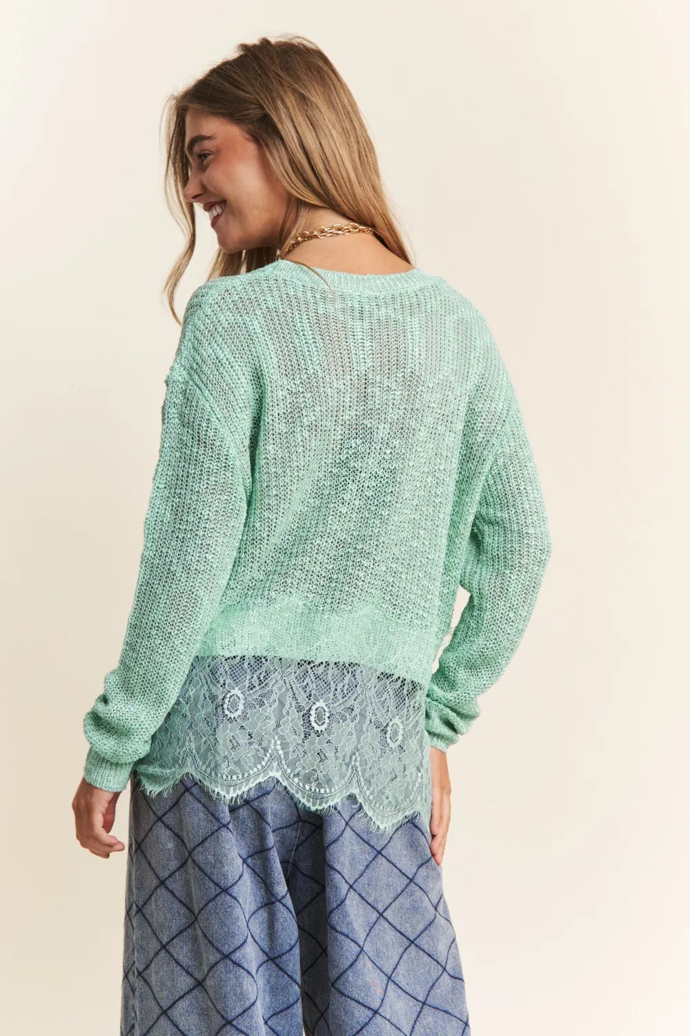 Sage green J.NNA lace detail long sleeve knit top by Trendsi featuring delicate lace accents and a fitted, cozy design.