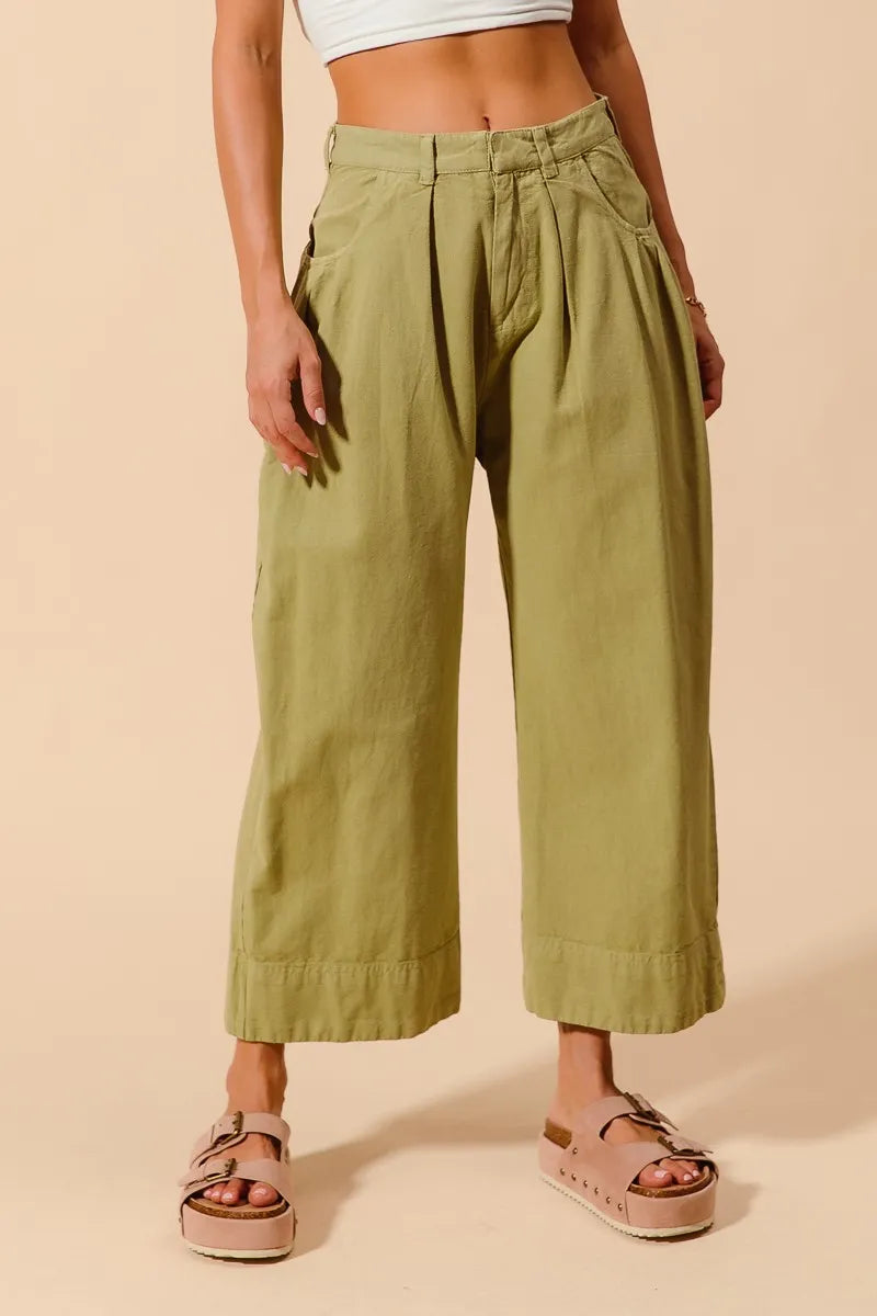 Trendsi sage green mid-rise wide-leg chino pants with pockets, casual and stylish for everyday wear.