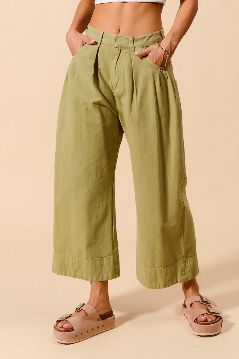 Trendsi SO ME mid-rise wide-leg chino pants with pockets in sage green, casual and comfortable for everyday wear.