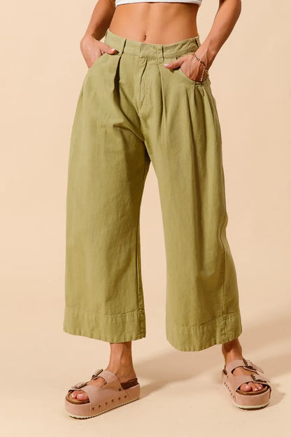 Trendsi SO ME mid-rise wide-leg chino pants with pockets in sage green, casual and comfortable for everyday wear.