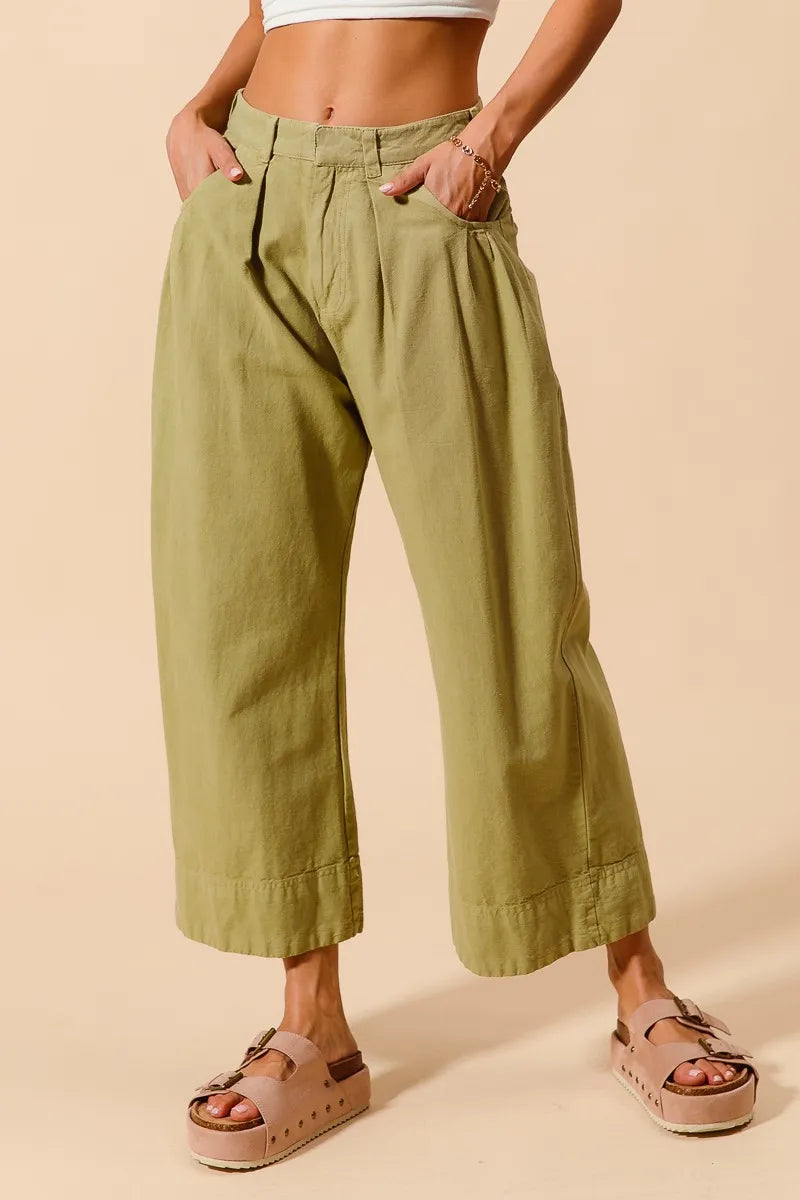 Sage green SO ME mid-rise wide-leg chino pants with pockets, stylish and comfortable for casual wear.