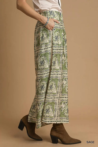Umgee bohemian print pants with pockets, featuring a relaxed fit and earthy pattern, ideal for casual and boho styles.