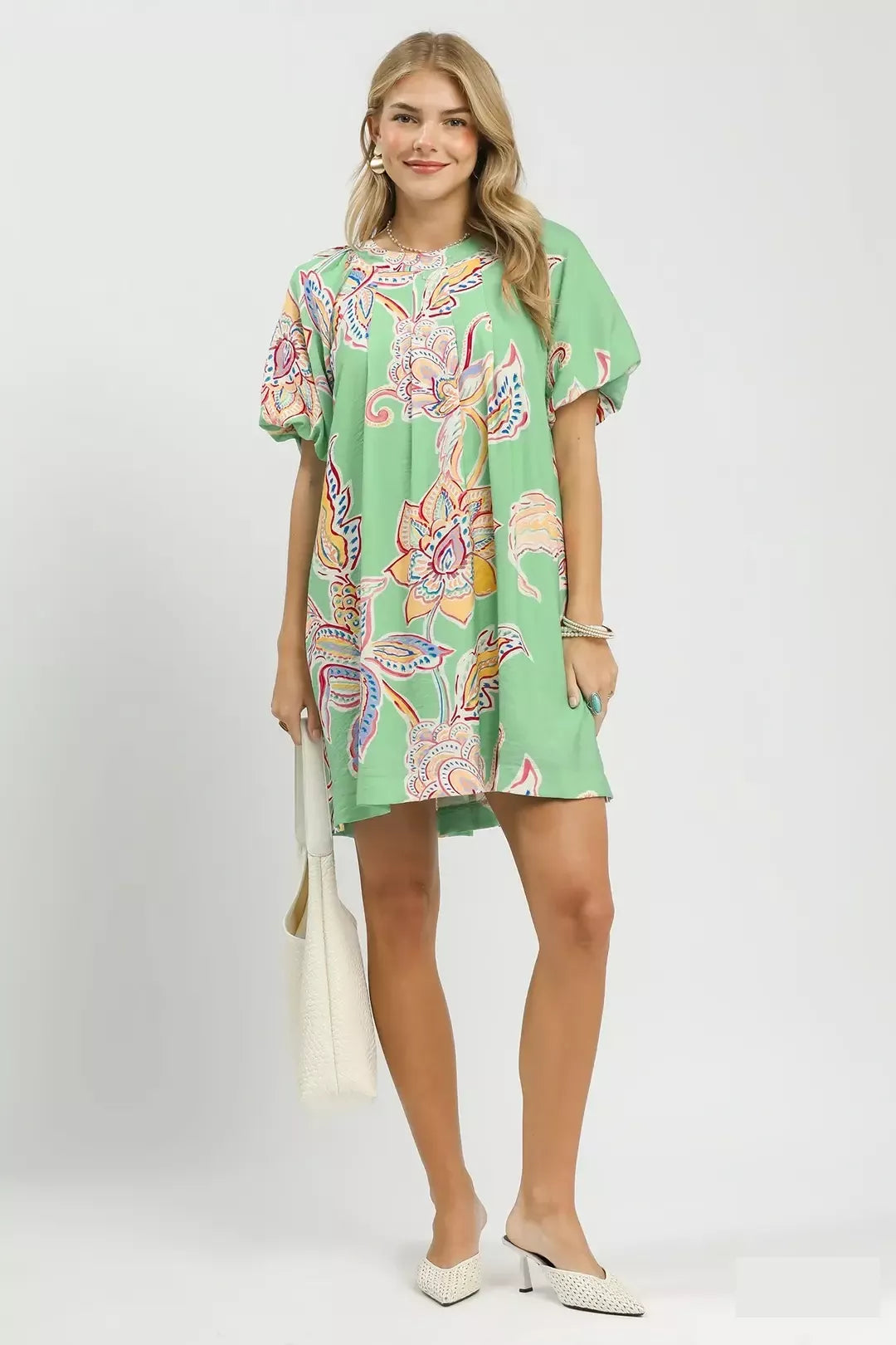Umgee boho floral print mini dress with pockets, featuring a relaxed fit and short sleeves, perfect for casual summer wear.