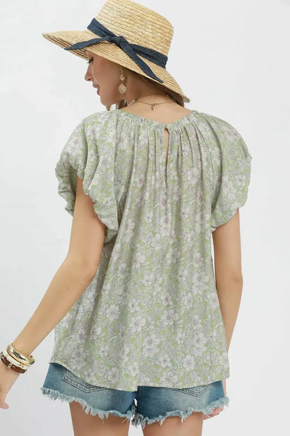 Sage green Umgee floral puff sleeve blouse with ruffled details, lightweight fabric, and a feminine, flowy silhouette.