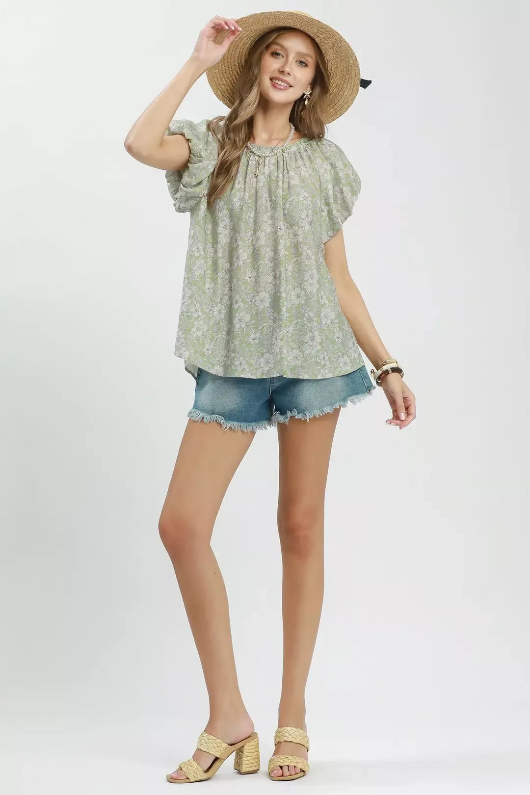 Sage green Umgee floral puff sleeve blouse with ruffled details and a relaxed fit, perfect for casual and spring outfits.