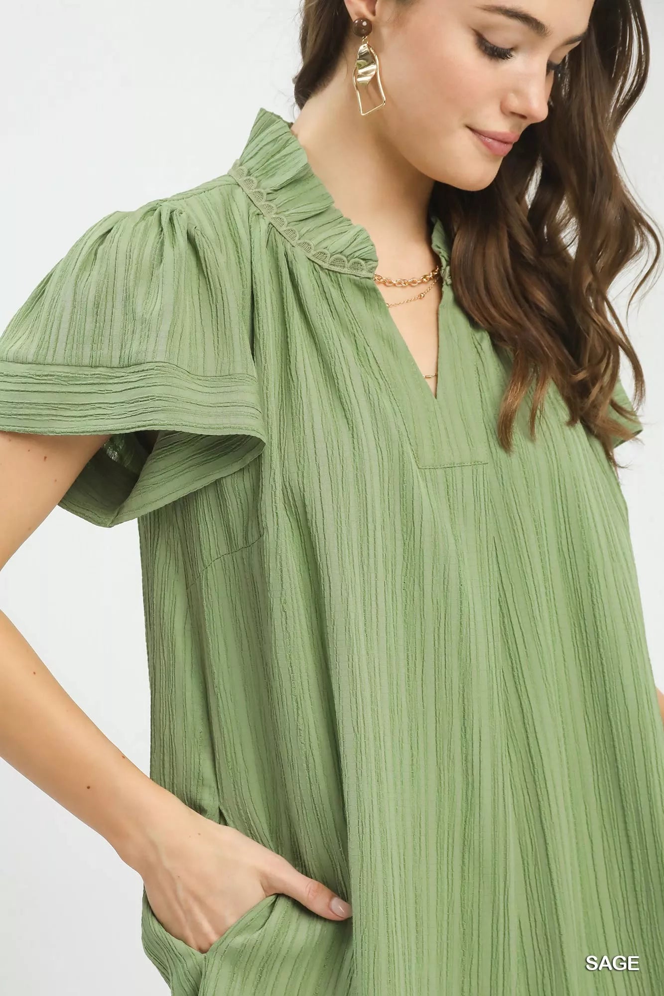 Sage green Umgee Flutter Sleeve V-Neck Shift Dress with relaxed fit and short flutter sleeves, perfect for casual wear.