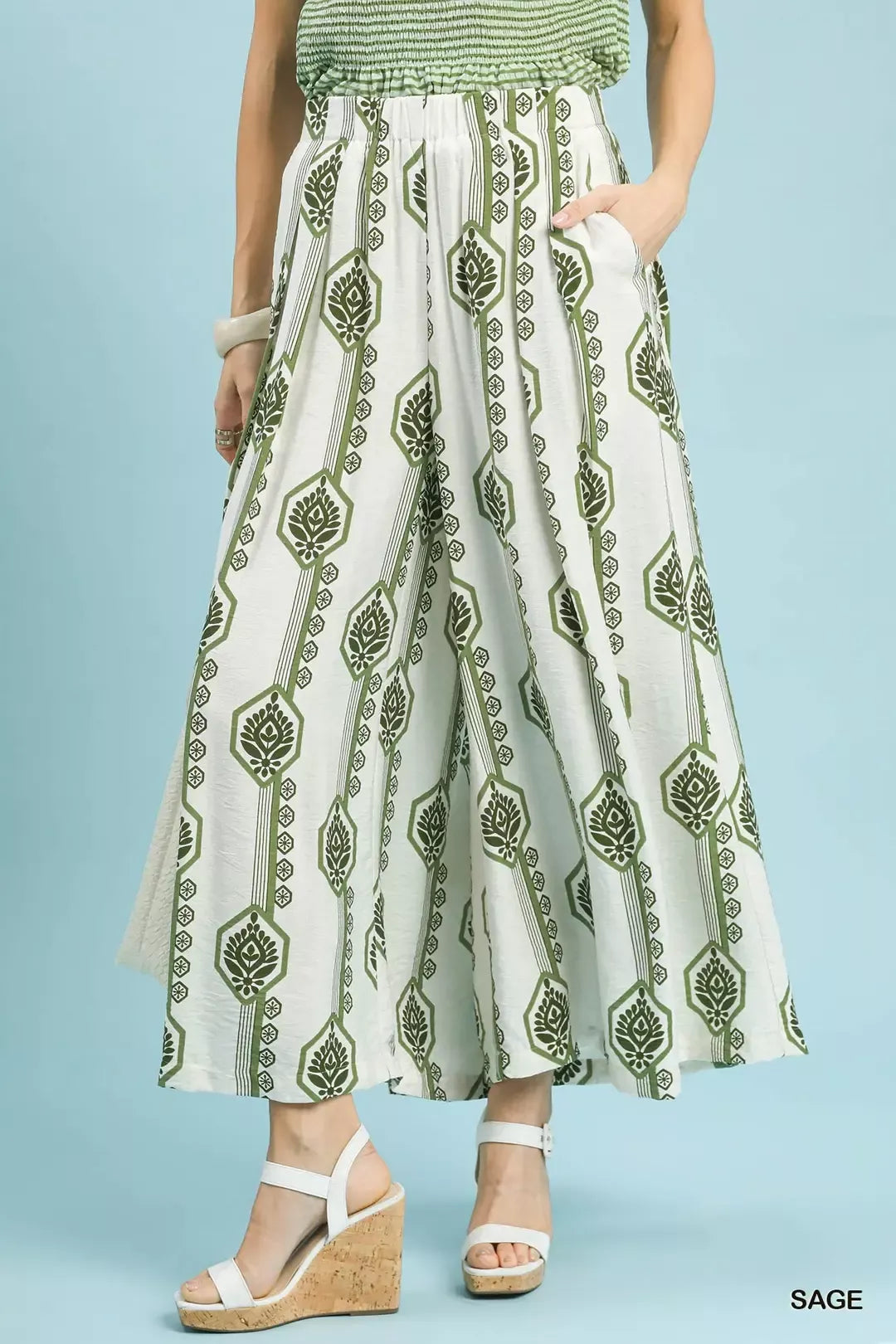Sage green Umgee geometric boho print wide-leg pants with relaxed fit and flowy fabric, stylish for casual and bohemian looks.