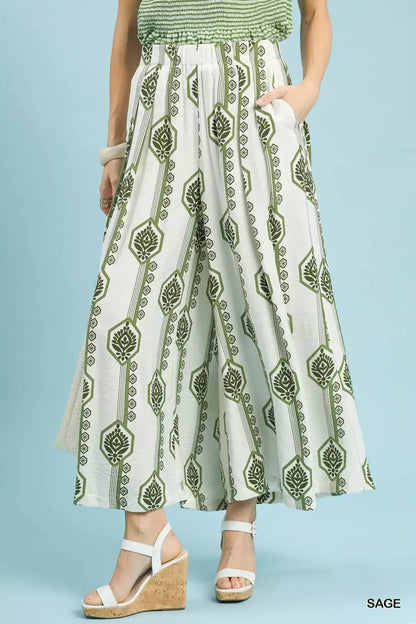 Sage green Umgee geometric boho print wide-leg pants with relaxed fit and flowy fabric, stylish for casual and bohemian looks.
