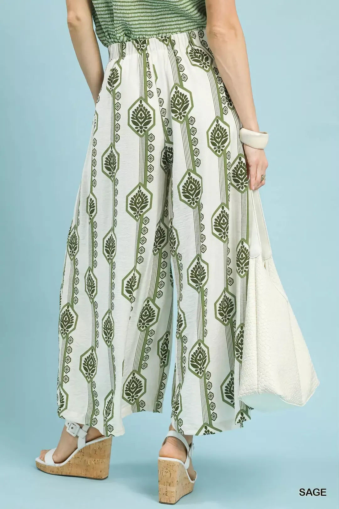 Umgee Geometric Boho Print Wide Leg Pants with relaxed fit and bold pattern, styled with casual wear.
