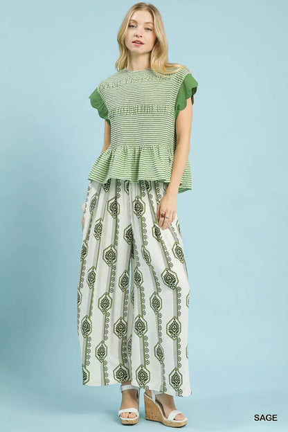 Umgee geometric boho print wide-leg pants in sage color, featuring a relaxed fit and stylish geometric pattern.