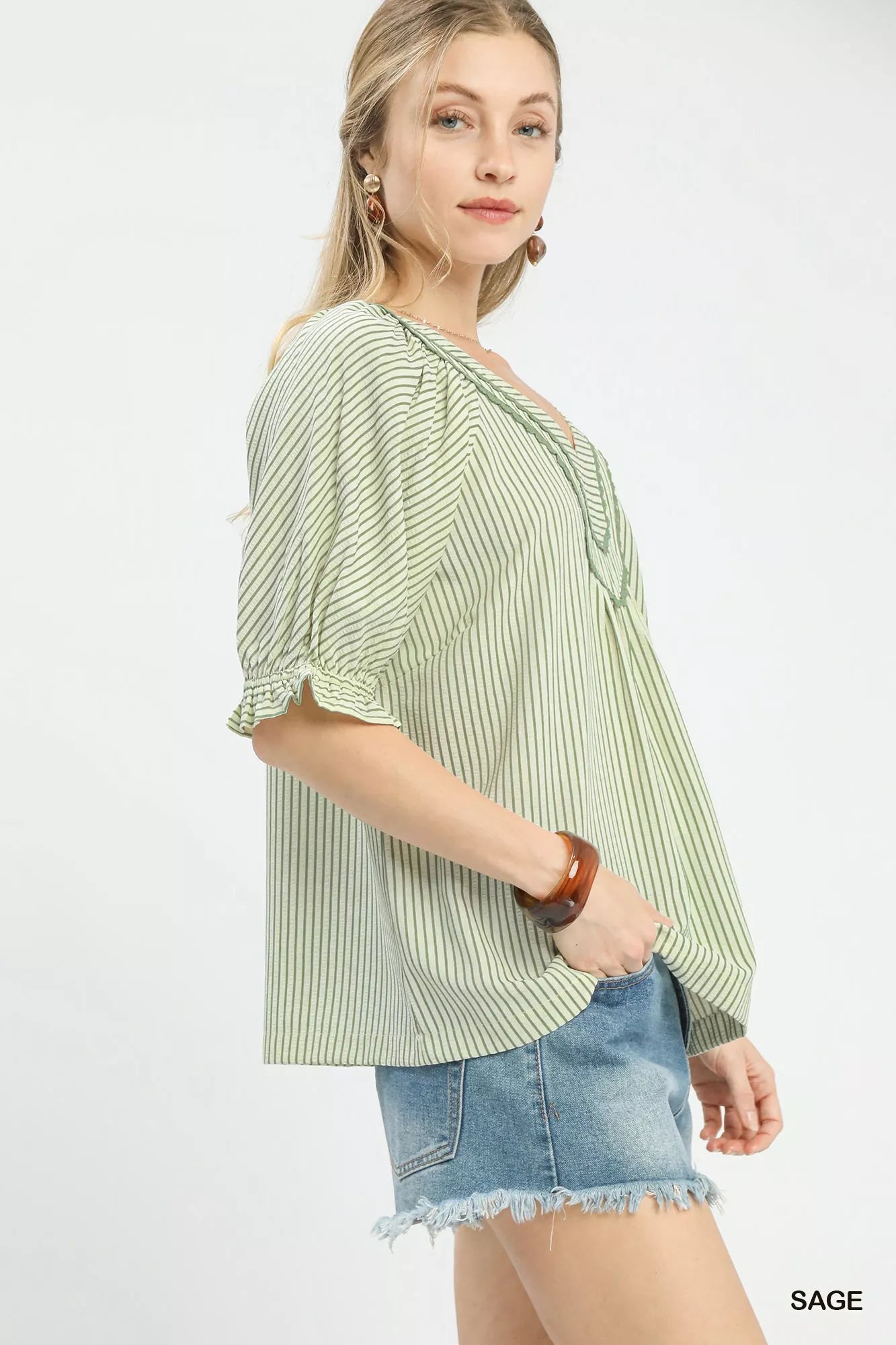 Sage green and white striped Umgee V-neck blouse with long sleeves, casual stylish top for women.