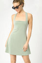 Sage green Umgee crisscross square neck active dress by Trendsi, shown in XS size with a stylish and comfortable fit.