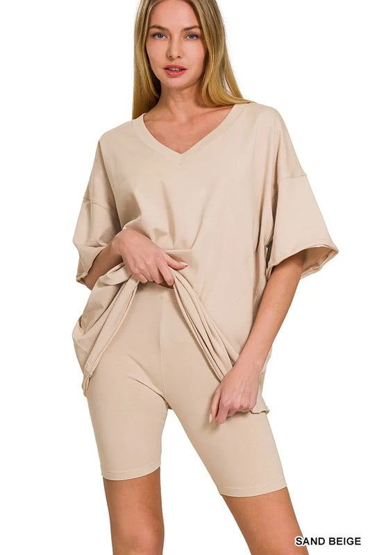 Sand beige Zenana cotton V-neck top and biker shorts set, featuring a comfortable, casual loungewear look.