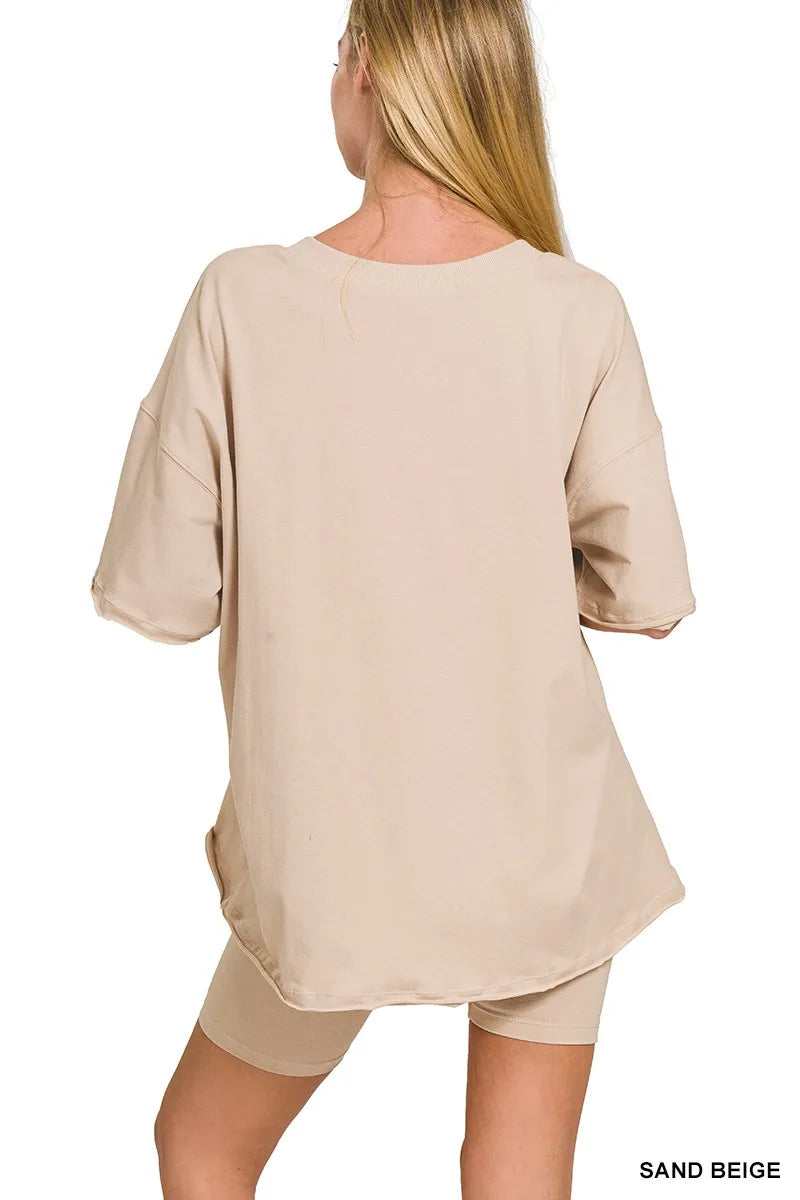 Sand beige Zenana cotton V-neck top and biker shorts set, casual loungewear ensemble, styled for comfort and relaxed fit.
