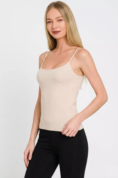 Sand beige Zenana double-layered round neck spaghetti cami by Trendsi, featuring a lightweight, layered design and spaghetti straps.