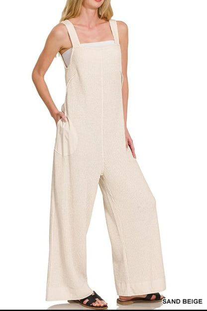 Sand beige Zenana Knit Waffle Wide Leg Overalls with adjustable straps and relaxed fit, styled with casual footwear.