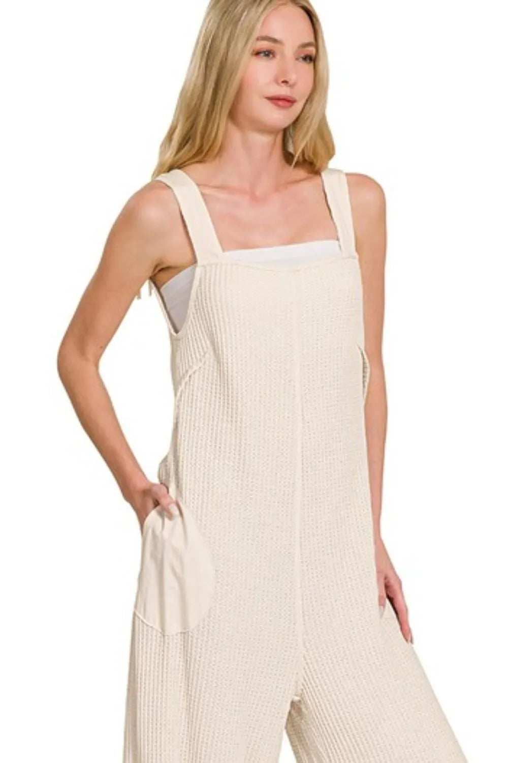 Sand beige Zenana Knit Waffle Wide Leg Overalls featuring a relaxed fit and wide-leg design, styled with casual accessories.