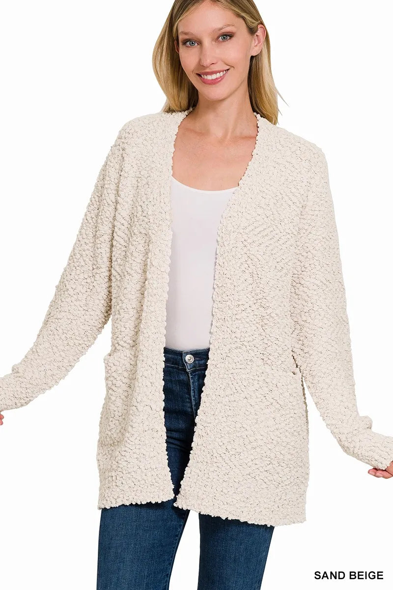 Sand beige Zenana long sleeve popcorn sweater cardigan with pockets, featuring a cozy textured knit and button closure.
