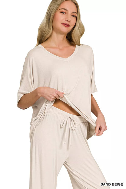 Sand beige Zenana V-neck oversized top and matching pants set, casual and comfortable loungewear from Trendsi.