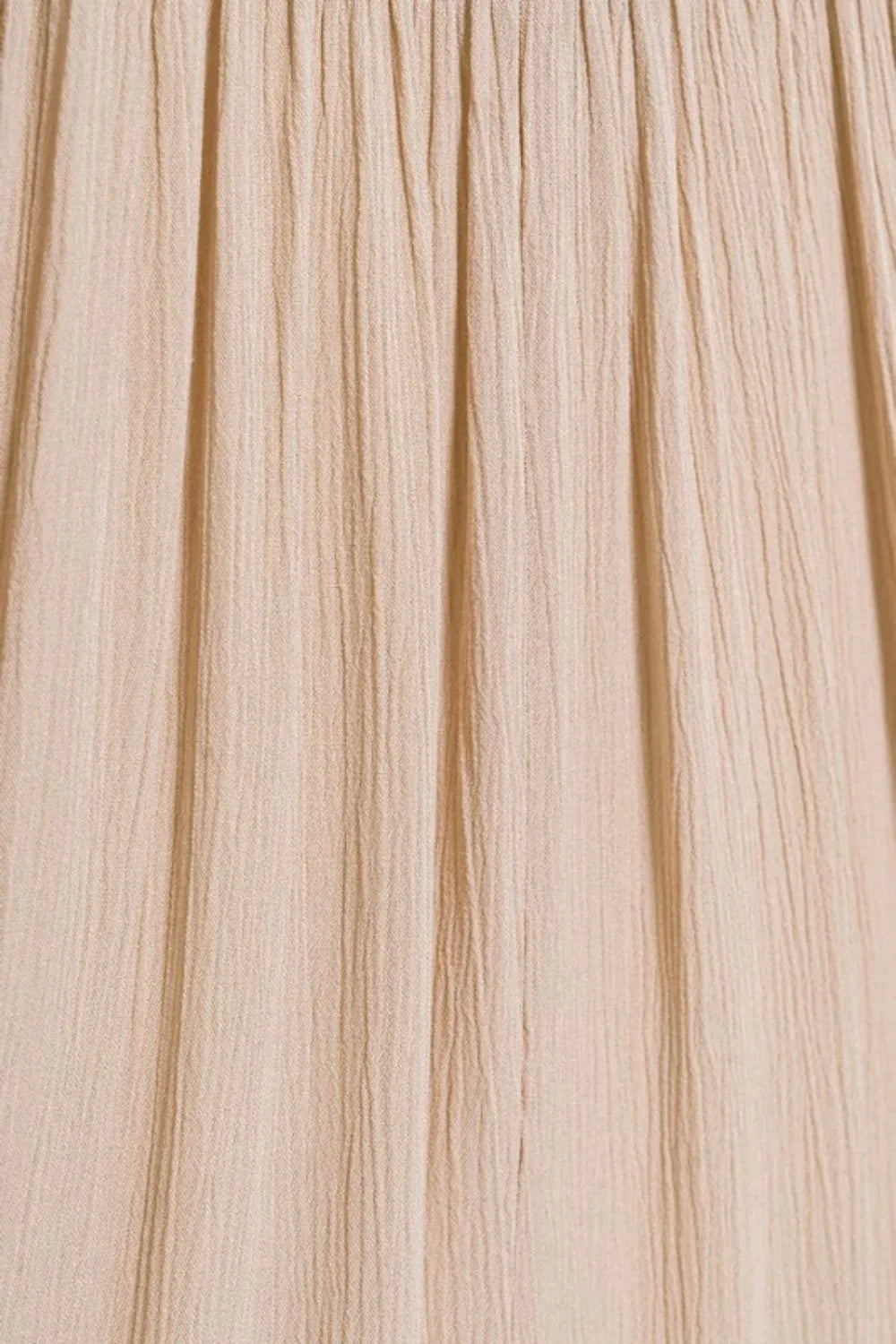 Sand beige Zenana woven crinkle maxi skirt with smocked waist and pockets, featuring a flowy, comfortable design.