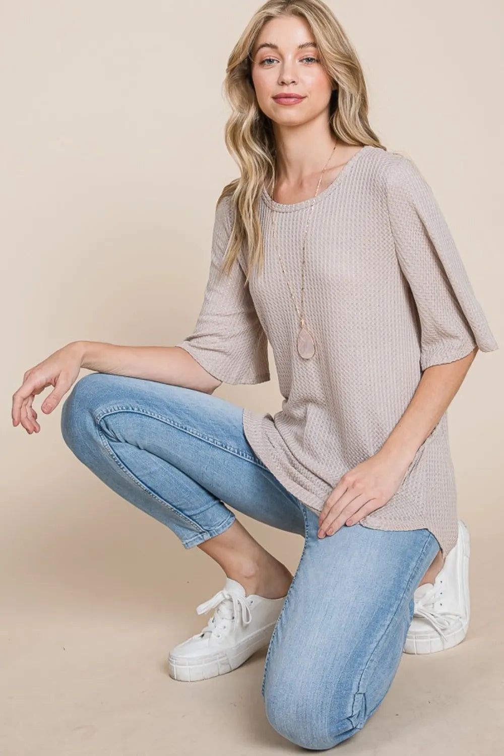 Sand-colored Trendsi BOMBOM round neck waffle knit T-shirt displayed on a mannequin, showcasing the textured fabric and casual fit.