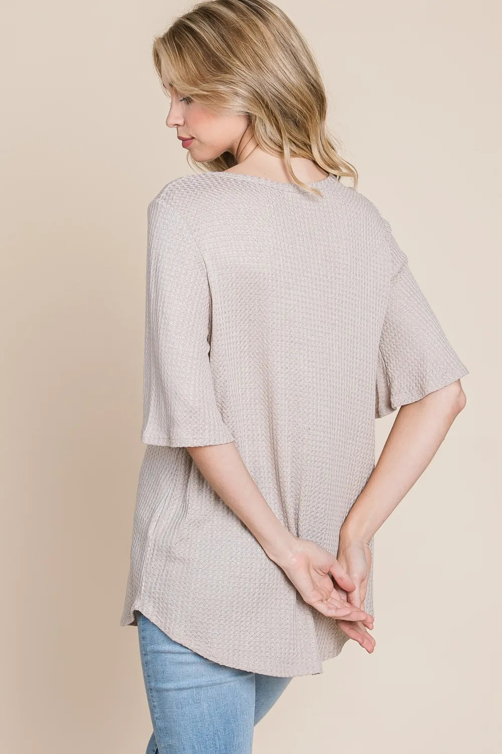 Sand-colored Bombom round neck waffle knit T-shirt by Trendsi, featuring a cozy textured fabric and classic fit.