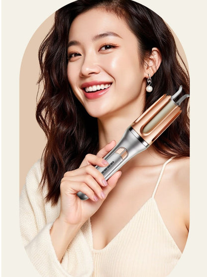 Silver automatic hair curling iron with European plug by Trendsi, showcasing its sleek design and curling barrel.