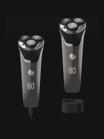 Silver-gray electric rotary shaver with LED display, featuring multiple rotary blades and ergonomic design by Trendsi.