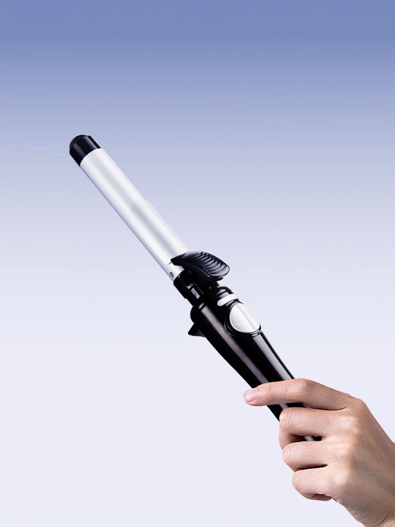 Silver Trendsi fast heating curling iron with North American plug, showcasing a sleek design for styling hair.