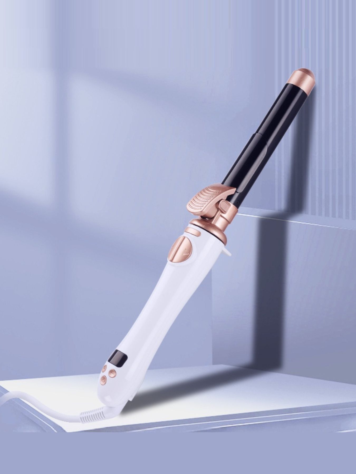 Silver Trendsi fast heating curling iron with North American plug, showcasing a sleek design for creating curls and waves.