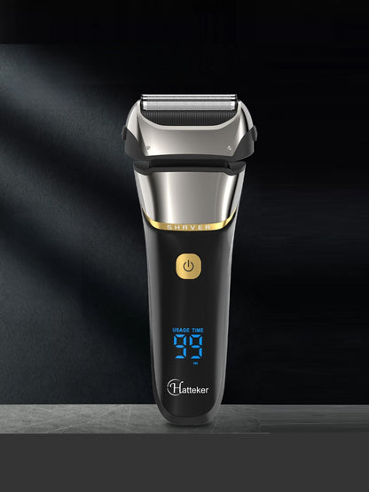 Silver electric foil shaver with LED display by Trendsi, showing close-up of the shaver's foil and control panel.