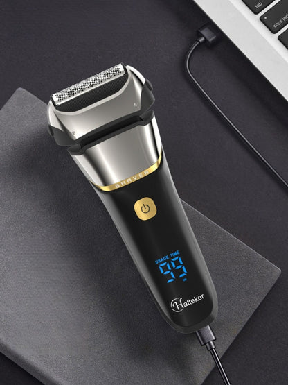 Silver electric foil shaver with LED display from Trendsi, showing close-up of foil head and sleek design.